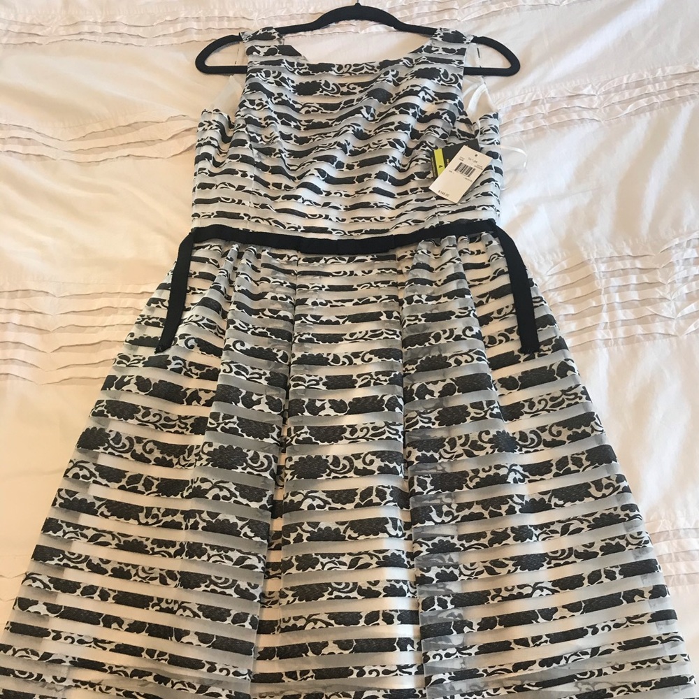 New with tags. Taylor dresses size 4